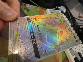 Pokemon Gengar & Mimikyu GX Teamup 186. Lightly played. Pickup only. Located Coppell TX. Sell or trade.