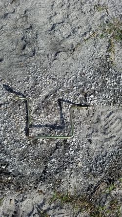 ((Belt keeper))riding lawn mower