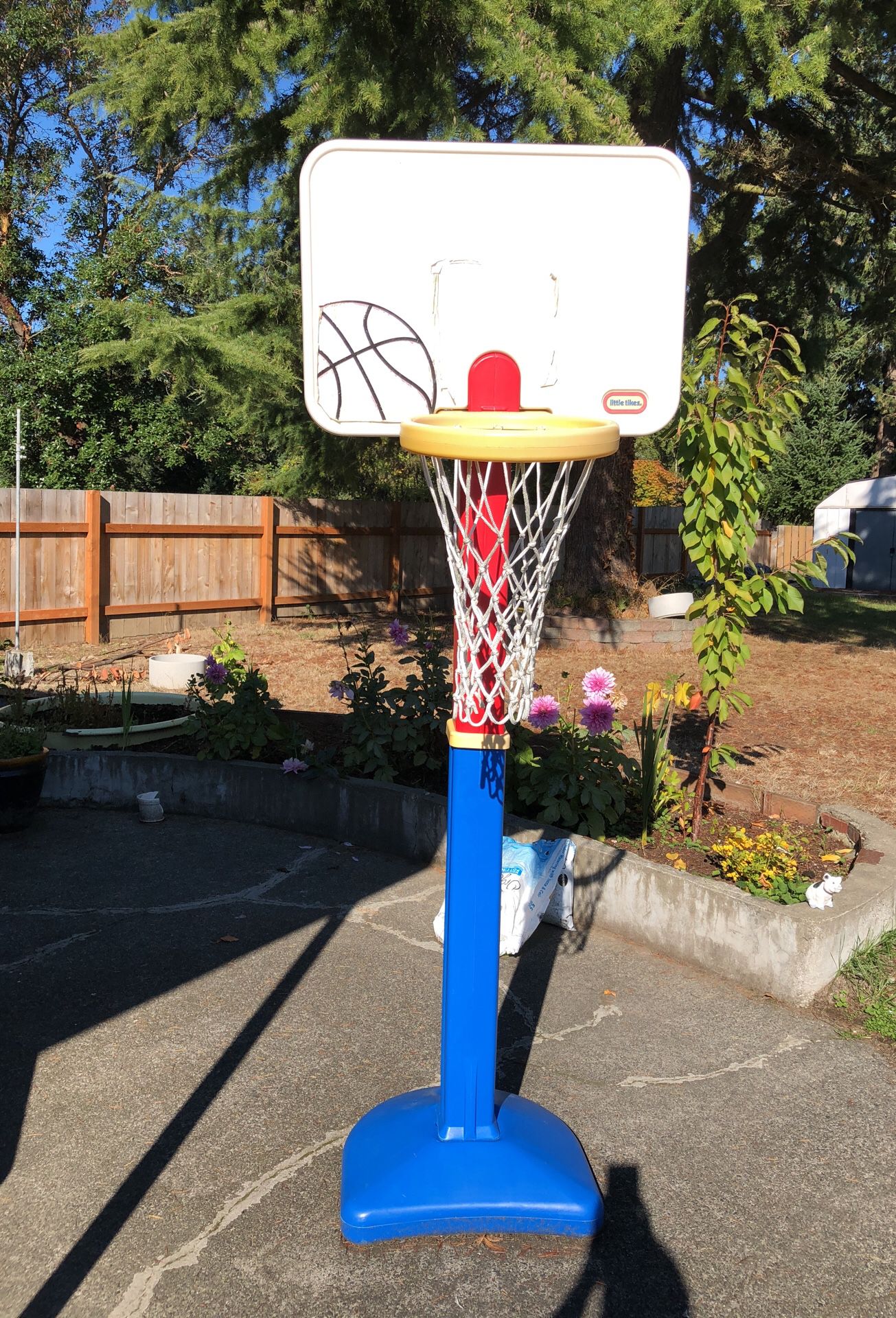 Basketball hoop adjustable.