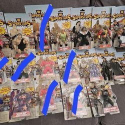 Collection of Retro WWE SUPERSTARS action  figures.  