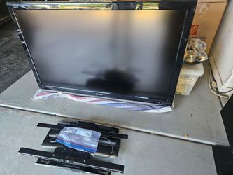 55" Sony Aquos TV and wall bracket