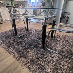 Glass dining table and chairs