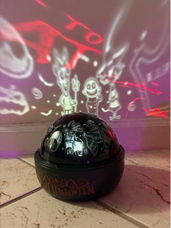 Pair of Gemmy Halloween LED ShadowLights Tabletop Projectors (IT Pennywise & Nightmare Before Christmas) - $50