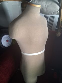 Tailors alter  mold Garments display.