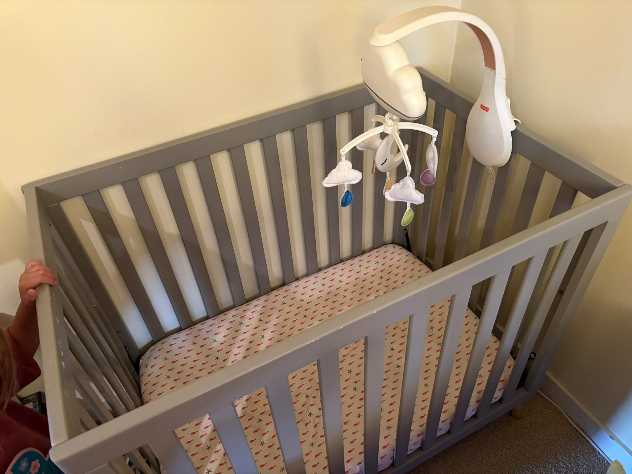 Mini Crib w/ Mattress, Sheets & Light-Up Musical Mobile – $75 OBO
