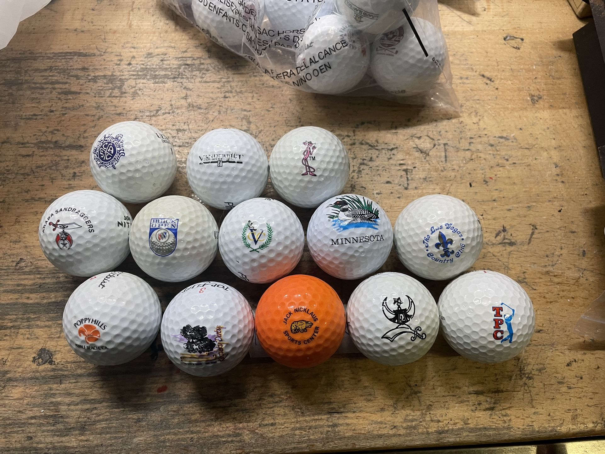 Golf ball collection. 13 Pc collectible golf balls with clubs logos