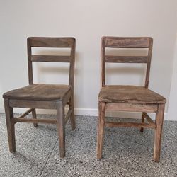2 small wooden chairs
