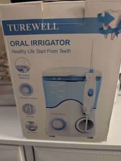 NEW WATER PICK IN THE BOX