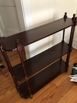 Small wooden shelving unit for floor or wall