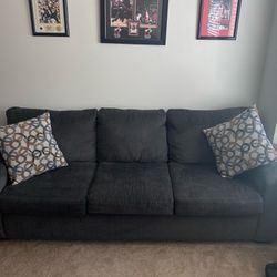 Dark Blue Couch W/ Decorative Pillows