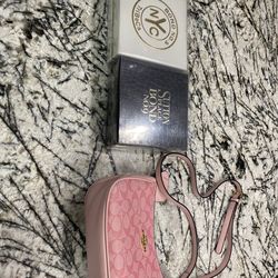 Cologne and a coach bag CHECK DESCRIPTION