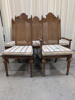 Set of Five American Street Furniture Carved Wood Dining Chairs with Cane Backs