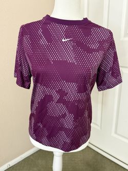 NWT Nike dri fit T, Kids Large Purple, Nike print in writing throughout