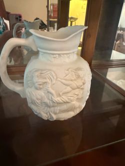 Beautiful Ethereal white pottery pitcher
