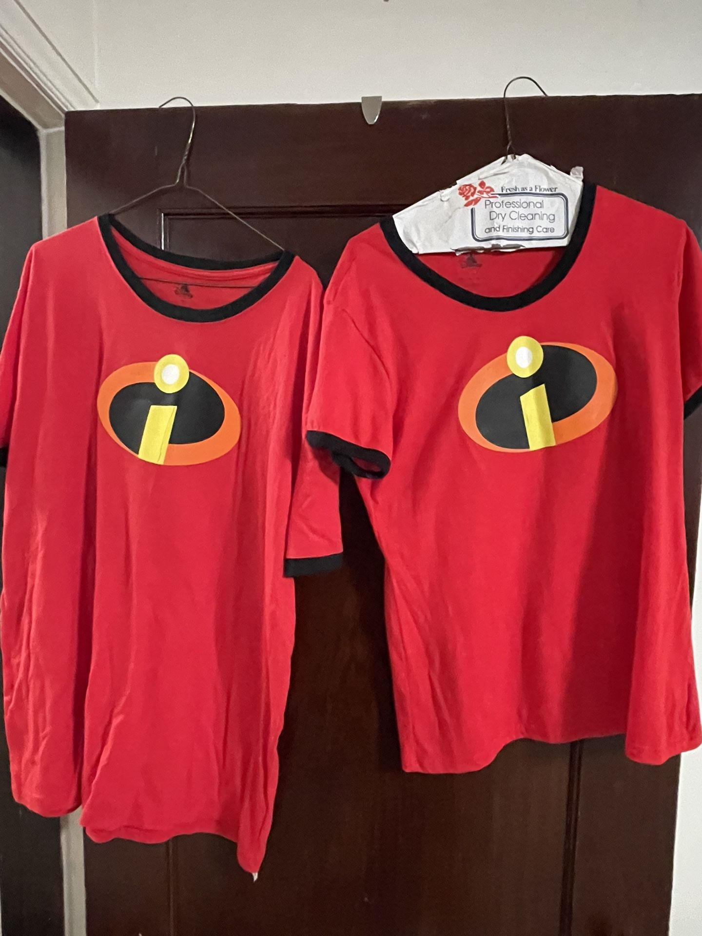 Incredibles Halloween shirts ( 2X men & L women ) women medium can fit in it $10 for both. $10