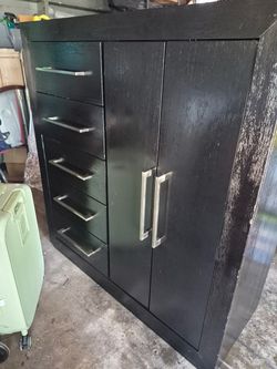 Beautiful dresser  . Top pull out drawer soft lined. Slide in drawers. Wardrobe pole. Basically new