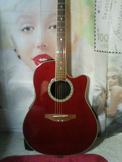 Red Ovation top of the line thin body.275.