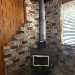 Freestanding wood fireplace