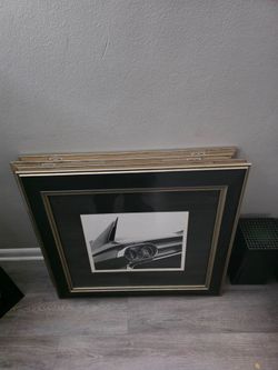 Old car wall hangings.