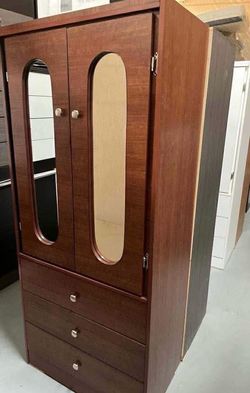 Tall closet with mirror
