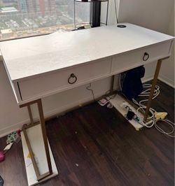 Desk with wireless charging pad