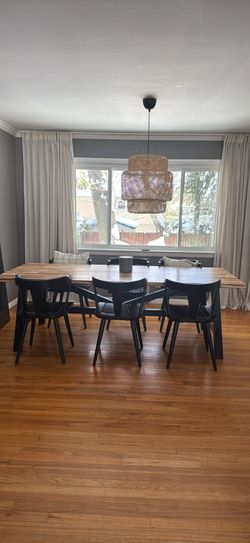 Dinning table with chairs.