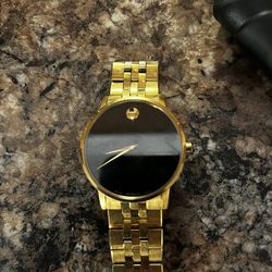 Movado museum classic gold tone watch