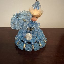 Vtg Safety Pin Doll Beaded Kitschy 1970s blue Umbrella Hat Painted Face blonde  This was my personal doll growing up.  So I can say for sure she has a