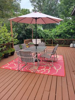 Patio set and rug and umbrella