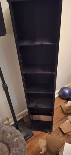 Rotating book/DVD shelf
