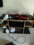 TV stand with DVD player and movie's