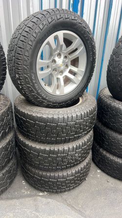 18 inch chevy rims with good tires $600