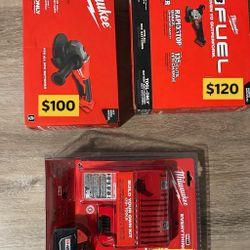 Milwaukee Grinders And Battery Charger.