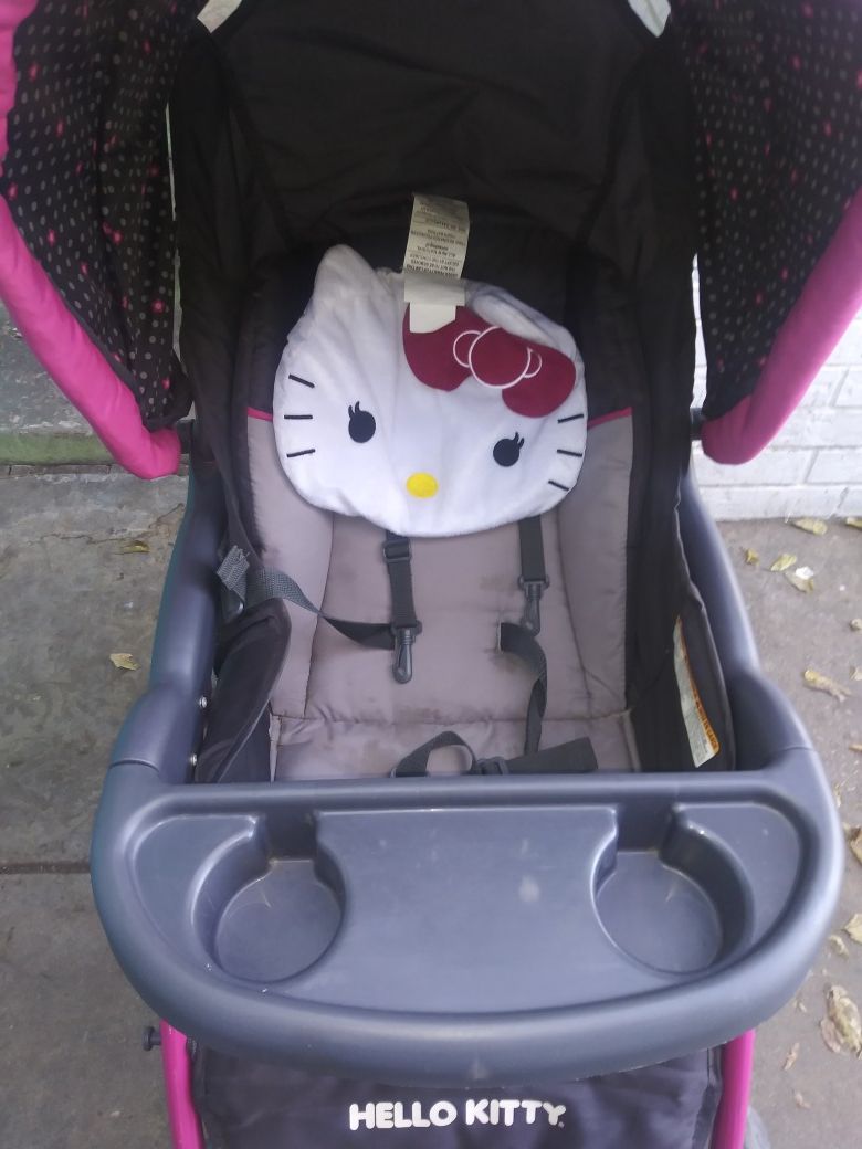 Hello kitty stroller and carseat bouncer