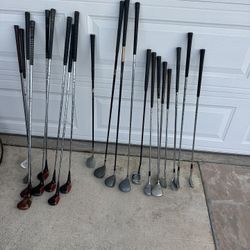 21 Assorted Golf Clubs