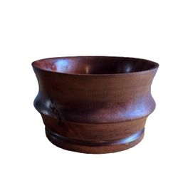 handcrafted, vintage wooden bowl, likely a fruit or serving bowl.  