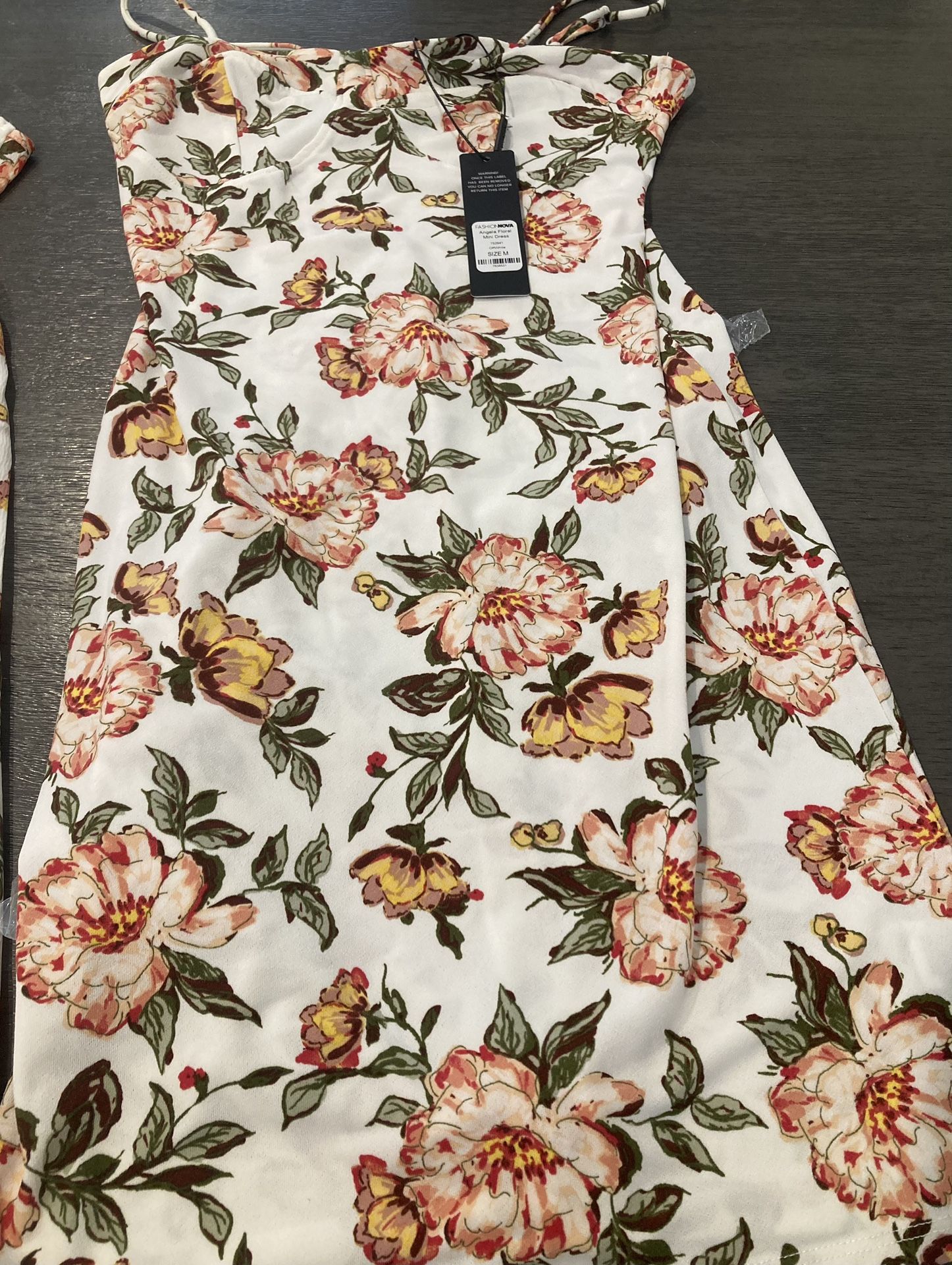 2 New Mini Dresses, 2 sweaters, 1 T-shirt, and 1 New Corset. Sizes S and M