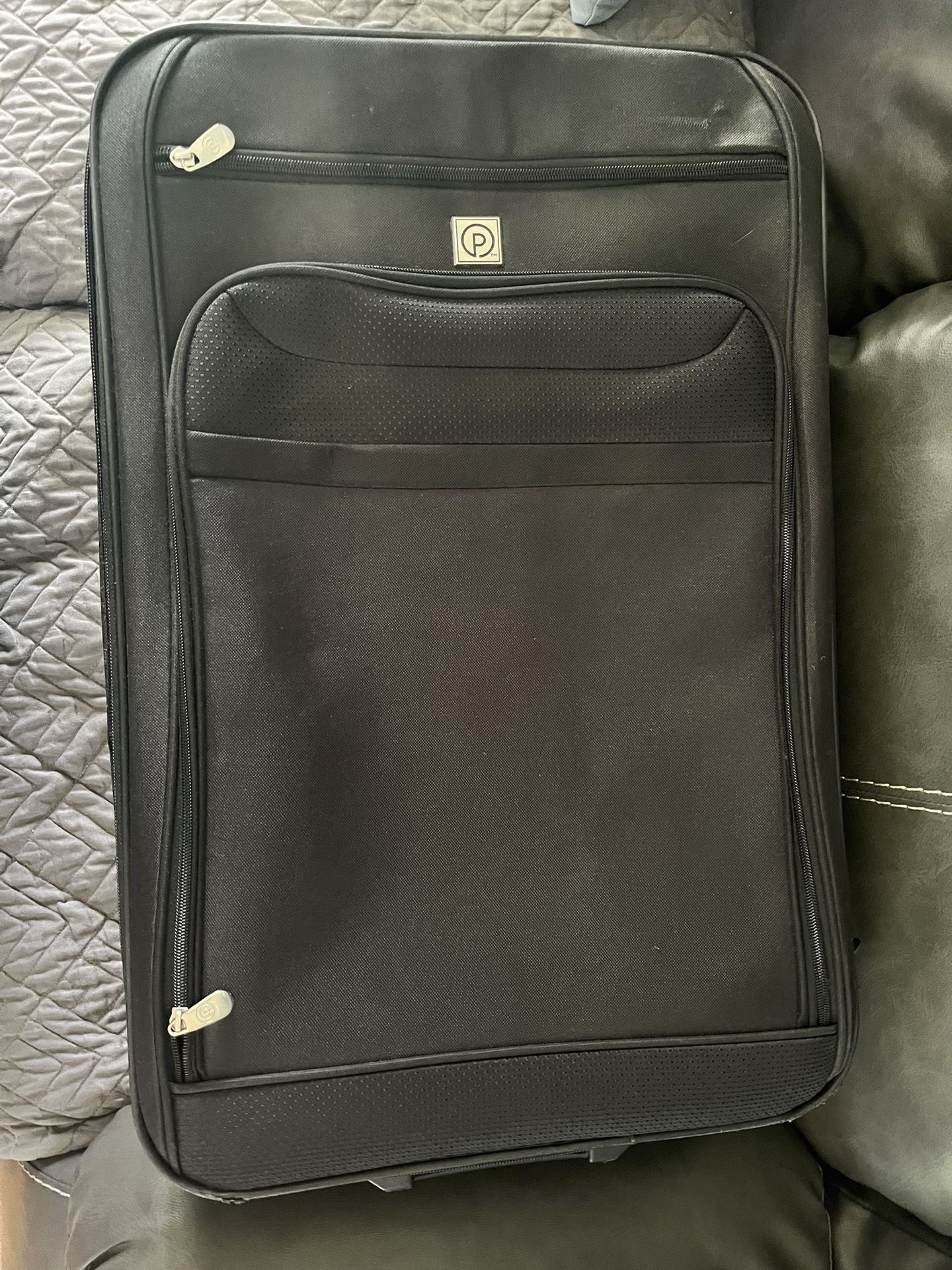 Two Identical Suitcases On Wheels