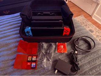 Like-New Nintendo Switch Bundle + 3 Games + 128GB microSD + Carrying Case