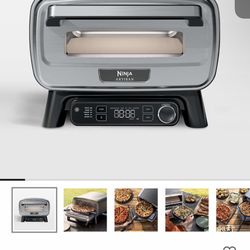 Pizza Oven 5and 1  brand new never opened it