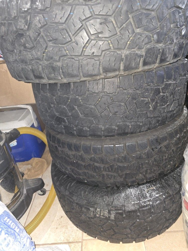 Curated visual reference: Low Mileage Tire Replacement Reference: Low Mileage A T Tire Set For Trucks For Sale