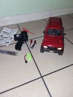 4x4 rc crawler has working head lights comes with everything for it has new tires on it.