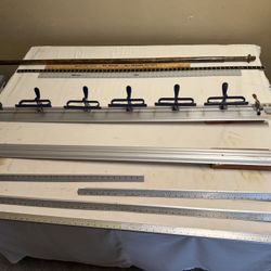 60” metal fabric clamps, straight edge cutting guide, measuring rulers for sewing cutting table