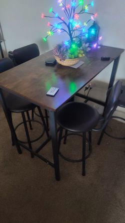 Table with bar stools