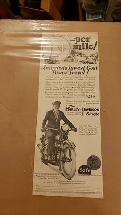 Old Harley Davidson motorcycle ads on cardboard