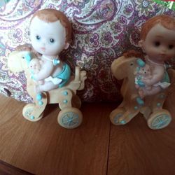 Baby on a rocking horse ornaments