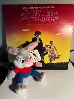 Disney vinyl with vintage plush