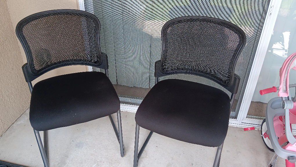 2  Black Polyutherane Padded Chairs