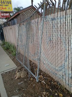 Metal fence on the side of 220 e la cadena riverside