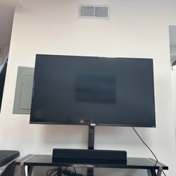 50” HD TCL Smart TV (internal Roku) And TV Stand